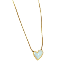 Minimalist gold titanium steel necklace featuring a white mother of pearl heart pendant