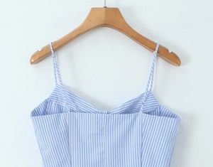 Detailed close-up of a blue and white striped camisole top with thin straps and V-neckline