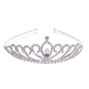 Detailed view of silver bridal crown with white rhinestones and a teardrop crystal