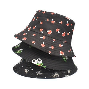 Three assorted mushroom and cartoon print bucket hats for sun protection in summer
