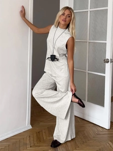 Light gray two-piece set featuring sleeveless high-neck top and high-waist wide-leg pants