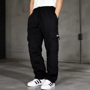 Detail showing elastic waistband with drawstring on black fleece cargo sports pants