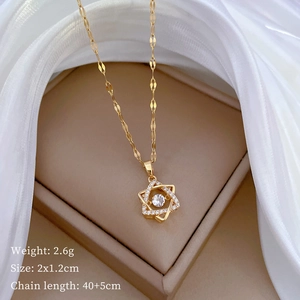 Detail of gold hexagram pendant with clear crystals and product size specifications