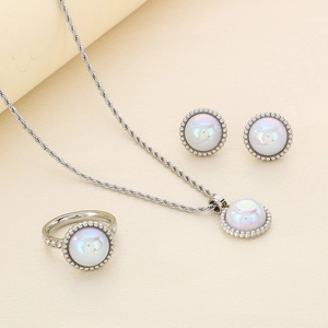 Elegant 3-piece silver jewelry set featuring shell inlays and twisted chain details