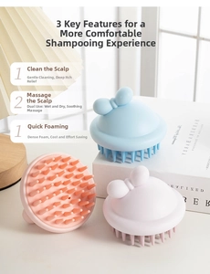 Detail view of bow-shaped silicone scalp massage brushes in soft pink and sky blue colors