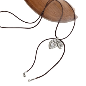 Minimalist double heart pendant necklace with rhinestones on brown cord, white background