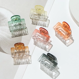 Set of six colorful transparent square hair claws for women in various matte shades