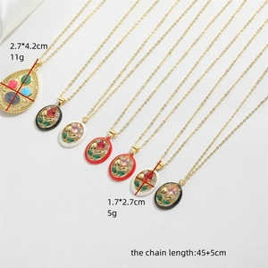 French vintage gold necklaces with oval enamel flower pendants and zircon details