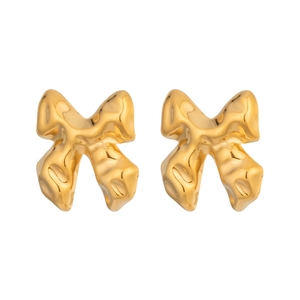 Elegant gold molten texture bow earrings in stainless steel for a modern vintage look