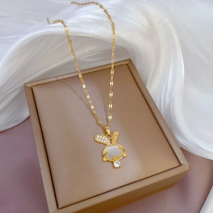 Golden titanium steel necklace with cat eye stone and micro-paved zircon rabbit pendant