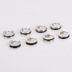 Set of four pairs of stainless steel hoop earrings with minimalist black enamel inlay