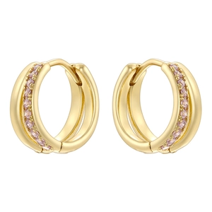 Close-up of gold-plated hoop earrings with micro-paved pink cubic zirconia stones
