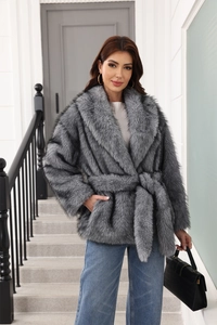 Detailed view of the soft faux fur texture and wide lapel on this grey belted coat