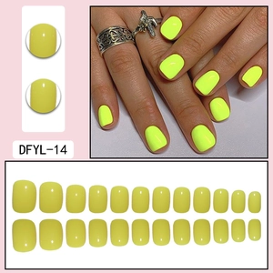Detail showing 24pcs neon yellow short square artificial nails with glossy finish