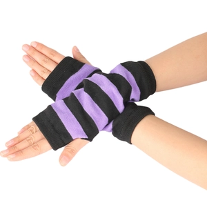 Close-up of purple and black striped knit fingerless gloves with elastic ribbed texture