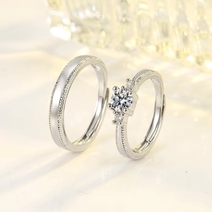 Elegant silver couple ring set with round solitaire zircon and beaded edge detail