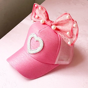 Pink girls baseball cap with lace bow, pearls and rhinestone heart on mesh fabric