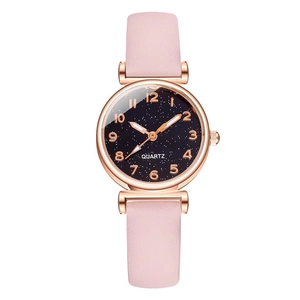 Elegant rose gold women's watch with starry blue dial and pink leather strap