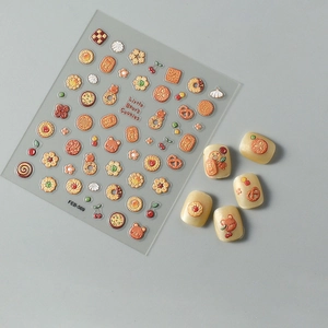 Detail of 3D embossed nail stickers featuring cute bear cookies and dessert designs