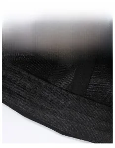 Close-up of the widened moisture-wicking sweatband inside the black baseball cap