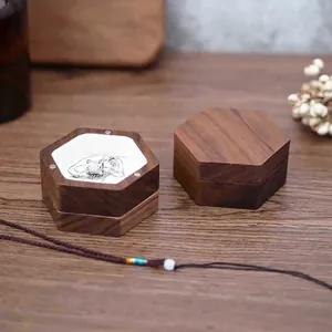 Handcrafted hexagonal walnut wood jewelry box set with white soft lining for necklaces