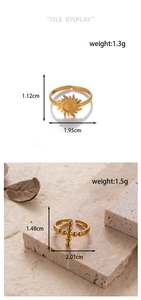 Detailed size and weight view of adjustable sun and cross rings in gold stainless steel