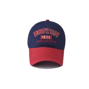 Close-up of Boston 1630 embroidery on navy and red cotton canvas baseball cap