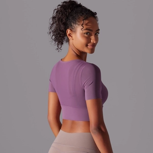 Side view of purple mesh crop top for yoga showing high elasticity and seamless fit