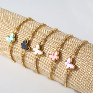 Detailed display of colorful butterfly bracelets with gold chain and cubic zirconia