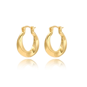 Macro detail of wide twisted gold earrings with mirror finish and snap closure