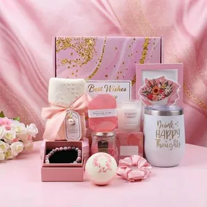Pink marble spa gift set with mug, scented candle, bath salts, and accessories