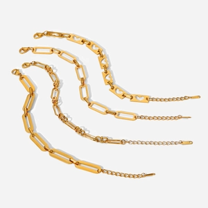 Macro view of four 18K gold plated stainless steel chain styles with lobster clasps