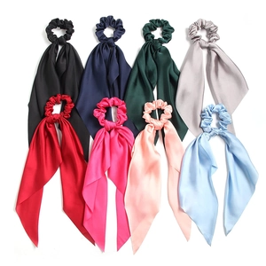 Eight pack of solid color satin scrunchies with long ribbons and smooth silky texture