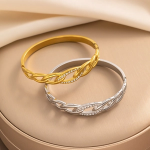 18K gold plated stainless steel twisted bangles set with sparkling zircon crystals