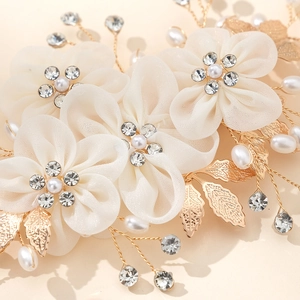 Handmade bridal flower hair clip with pearls and rhinestones on gold metal leaves