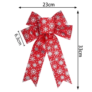 23cm Christmas bow decoration with silver snowflakes and glitter finish on red fabric