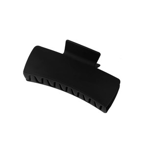 Matte black square hair claw clip with wavy teeth design for minimalist hair styling