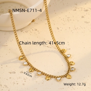 Detail view of gold heart fringe necklace with dimensions and 41+5cm chain length