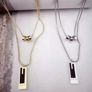 Double-layered stainless steel necklace in gold and silver with rectangular pendants