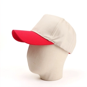 Detail of red and beige two-tone cotton baseball cap on a mannequin head model