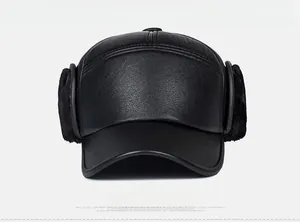 Front view of black winter leather hat with faux fur earflaps for cold weather warmth