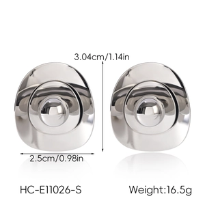 Detail view of irregular silver oval stud earrings with dimensions and weight info.