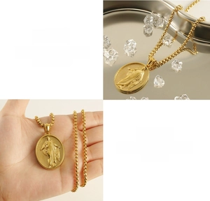 Detail of 18k gold plated 3D relief pendant with portrait carving on stainless steel chain