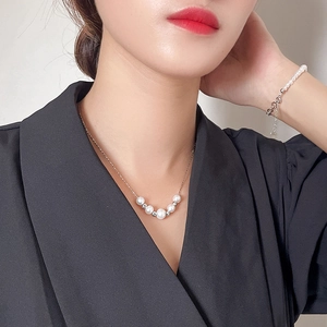 Elegant S925 silver necklace and bracelet set with delicate white freshwater pearls