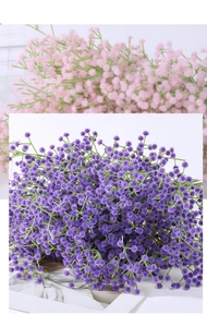 Close-up of purple and pink artificial baby's breath flowers for wedding decor