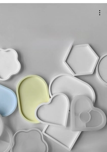 Stampi in silicone per sottobicchieri in varie forme tra cui cuore ed esagono per arte in resina
