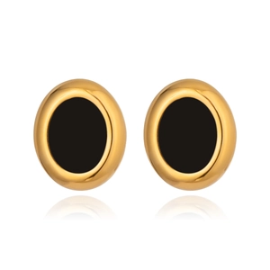 Detail view of oval geometric stud earrings with gold plating and black enamel inlay