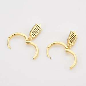 Detailed macro view of S925 sterling silver hoop earrings with ice cream drop pendants