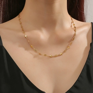 Golden heart and oval bead titanium steel necklace for women in minimalist style