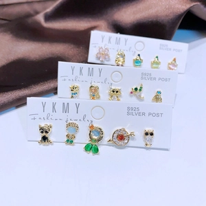 Close-up of S925 silver needle jewelry set with cat and flower colorful zircon studs